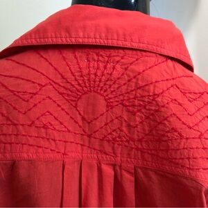MOTHER.  Women's orangey red Embroidered shirt.
Runs generous
